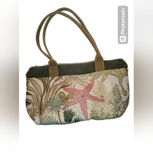 Cedar Key Canvas tote with ocean scene and double zippers, several pockets